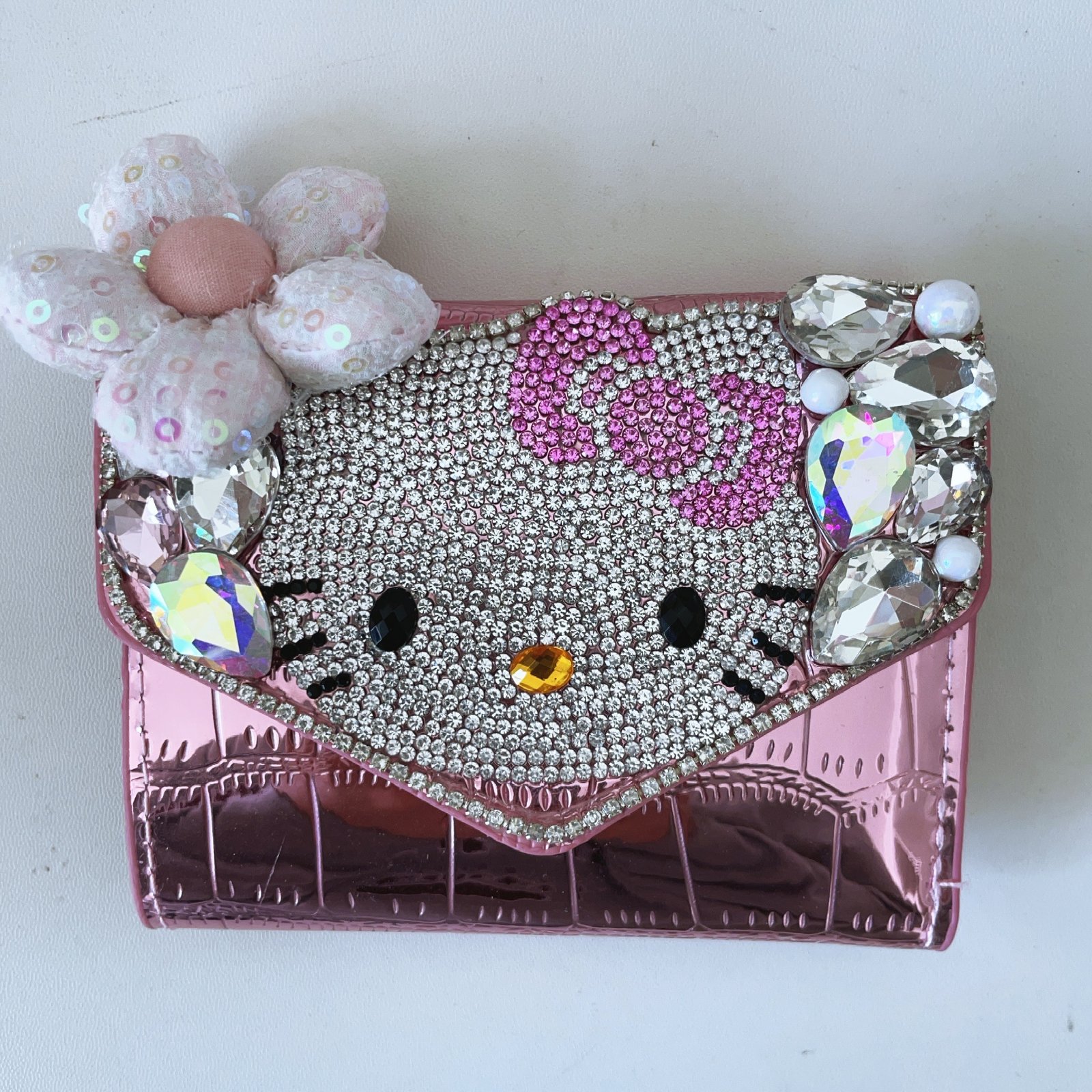 009 HK wallet with diamonds