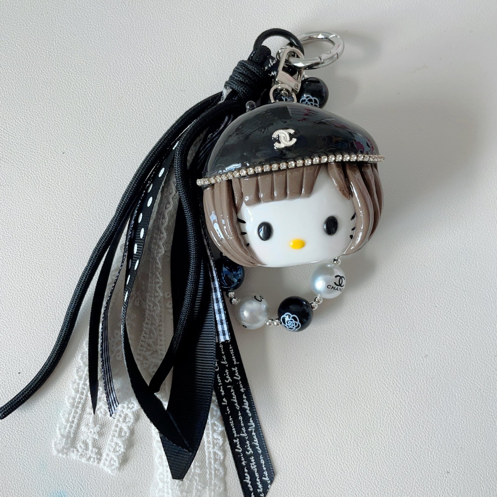 0008 Chanel‑style HK bag charm
